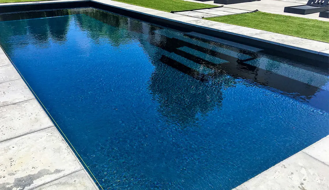The Grand rectangular fiberglass pool with great side entry steps from Leisure Pools Durham